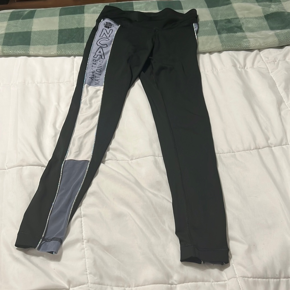 Black purple and white NCA legging in a small